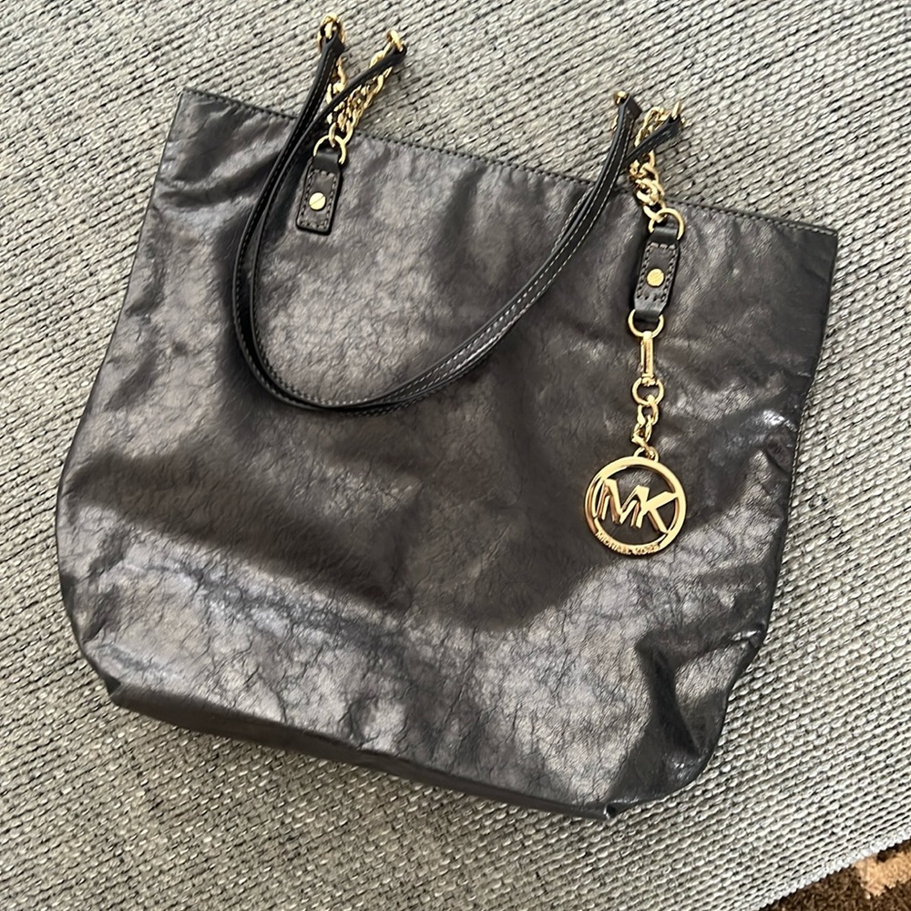 Michael Kors distressed leather purse.